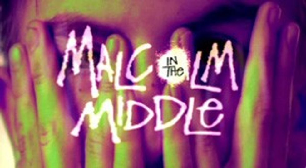 a boy hides his face in his hands behind the title, 'Malcom in the Middle" on a vintage VHS screen
