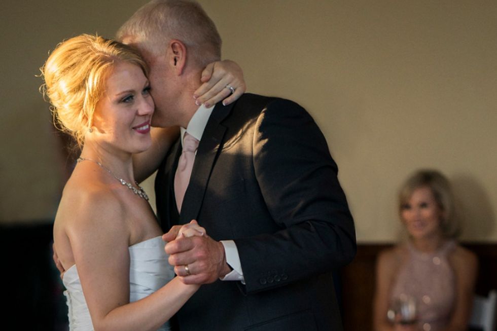 A father daughter dance at a wedding.