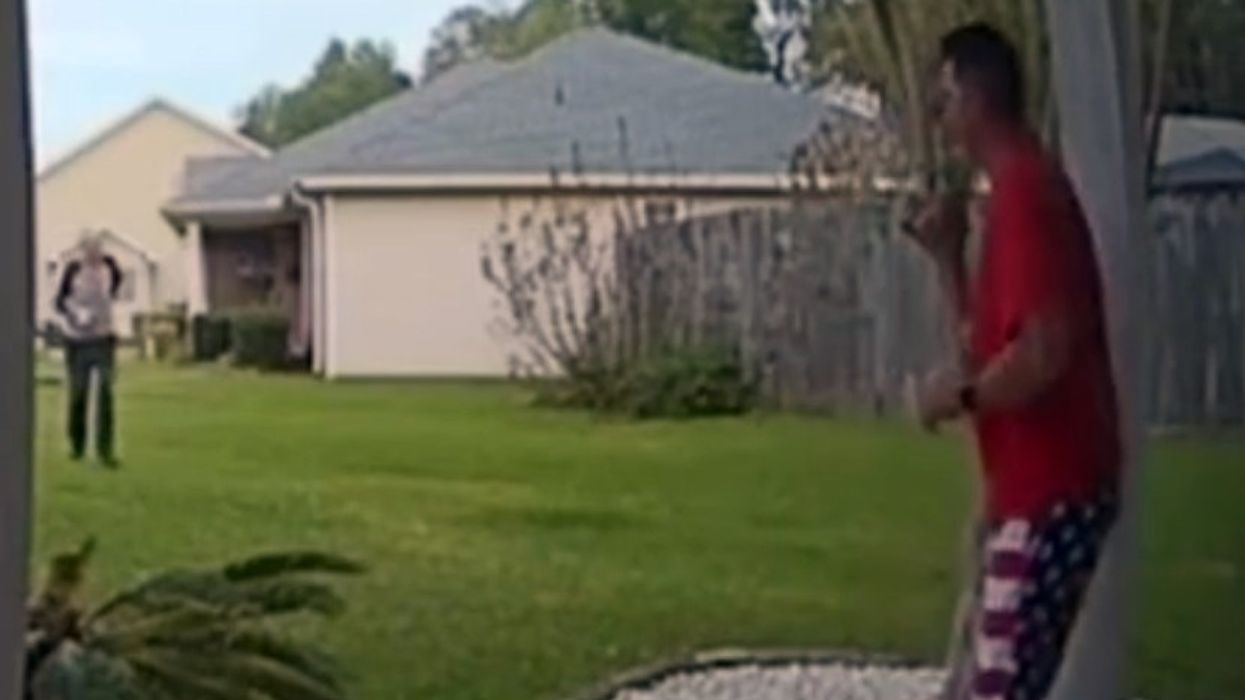 A man and his elderly neighbor share a morning conversation.