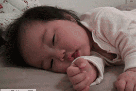 Cute GIF of a baby falling alseep
