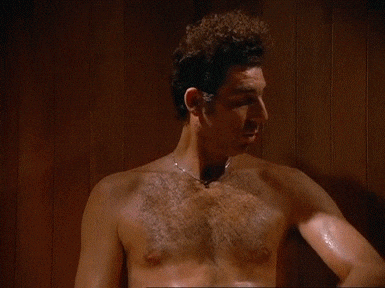 GIF from Seinfeld; Kramer saying "it's like a sauna in here" to George and Jerry while in a sauna
