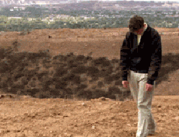 gif of a man walking while looking dejected