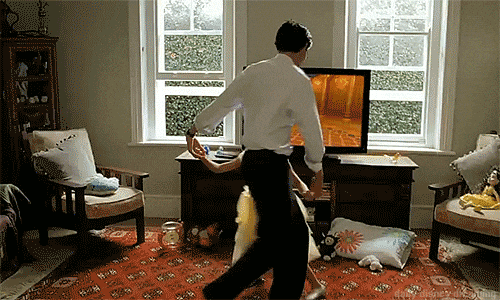 gif of Dad and daughter dancing in the living room