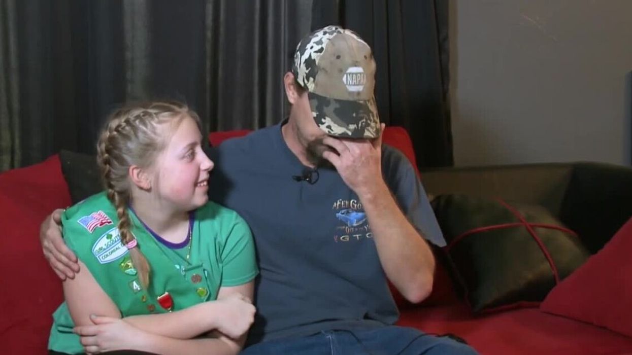 Girl Scout Vada Carawan with her father