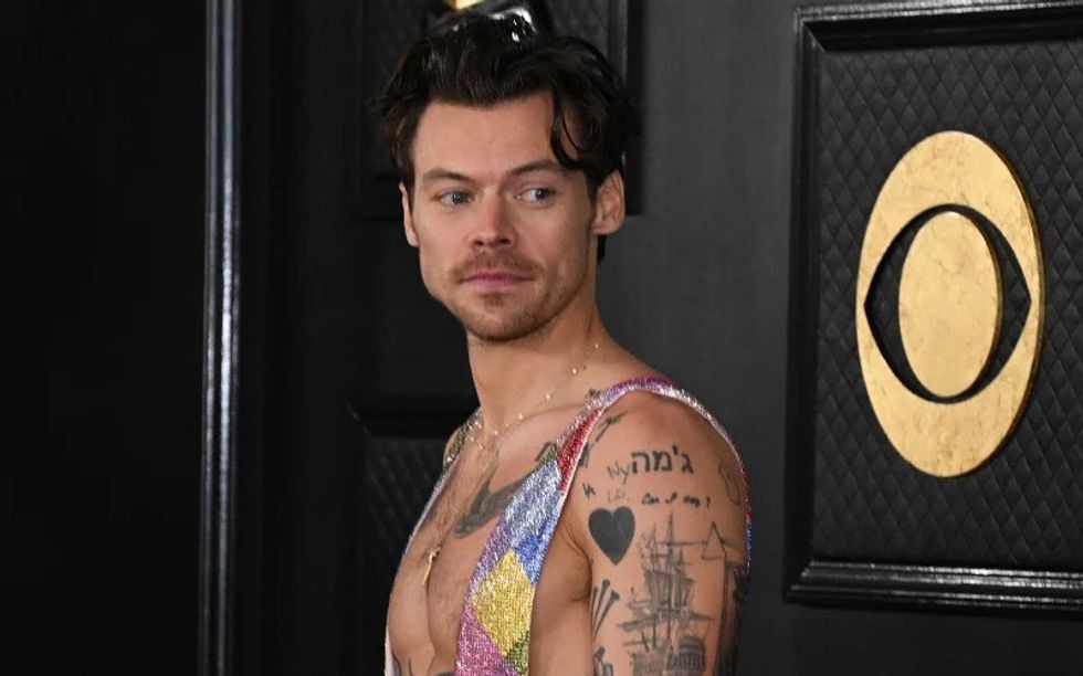 Harry Styles poses for photo