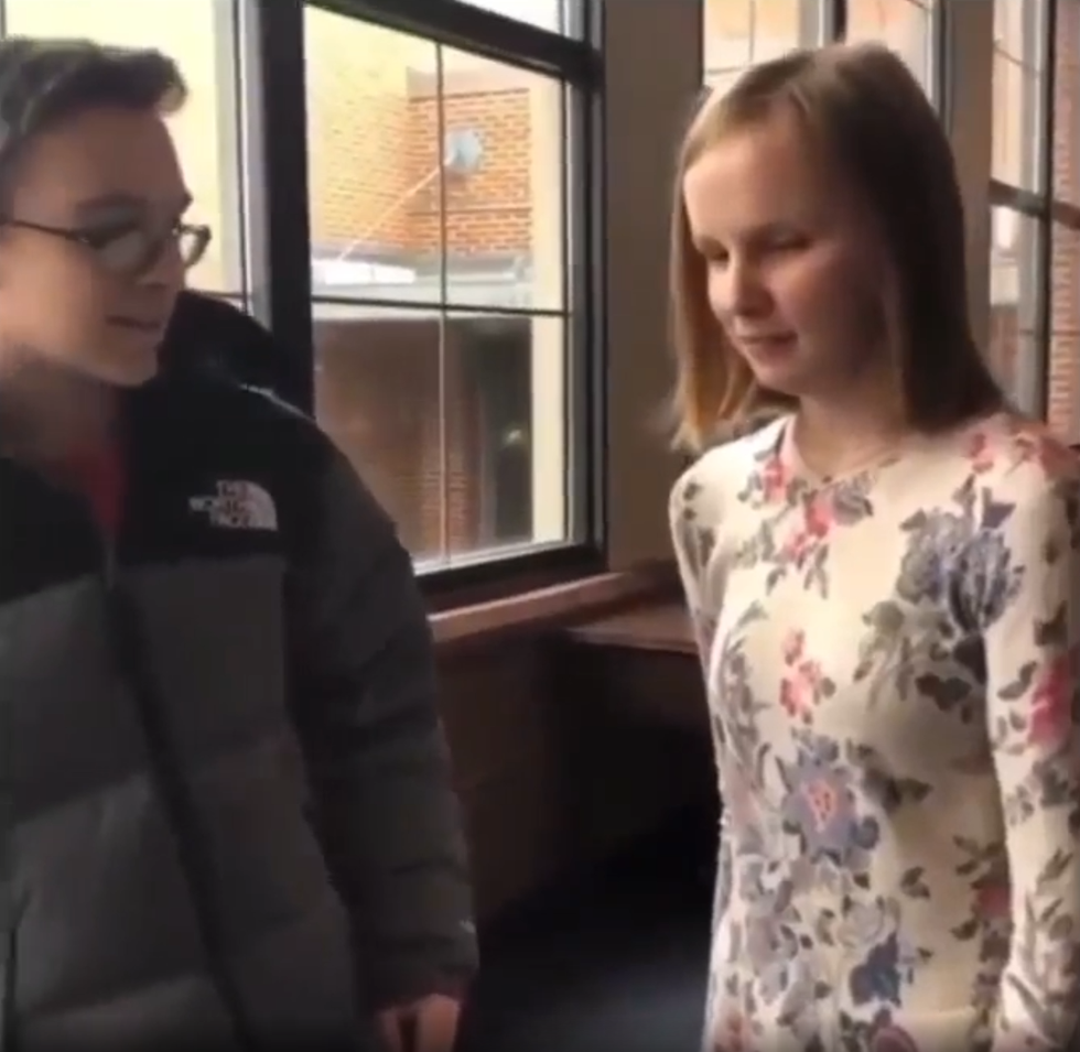 Jake Schwartz and Paige Drury moments before he creatively asked her to prom.