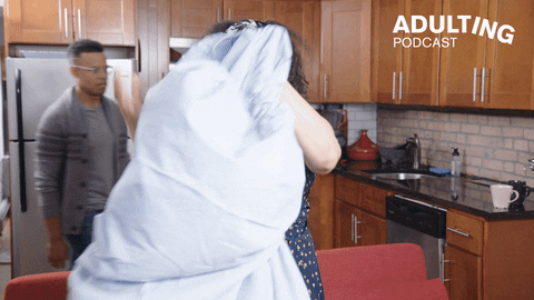 woman inspecting sheets