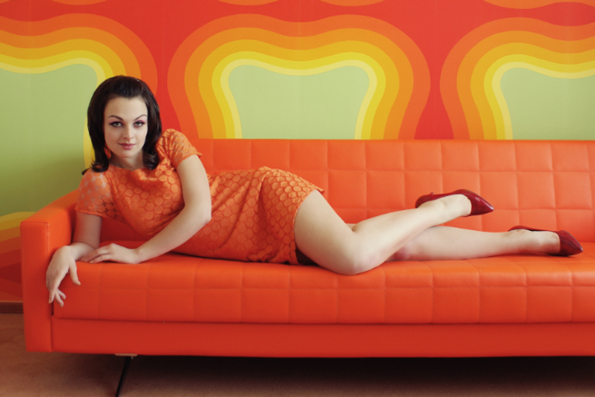Woman lying on couch